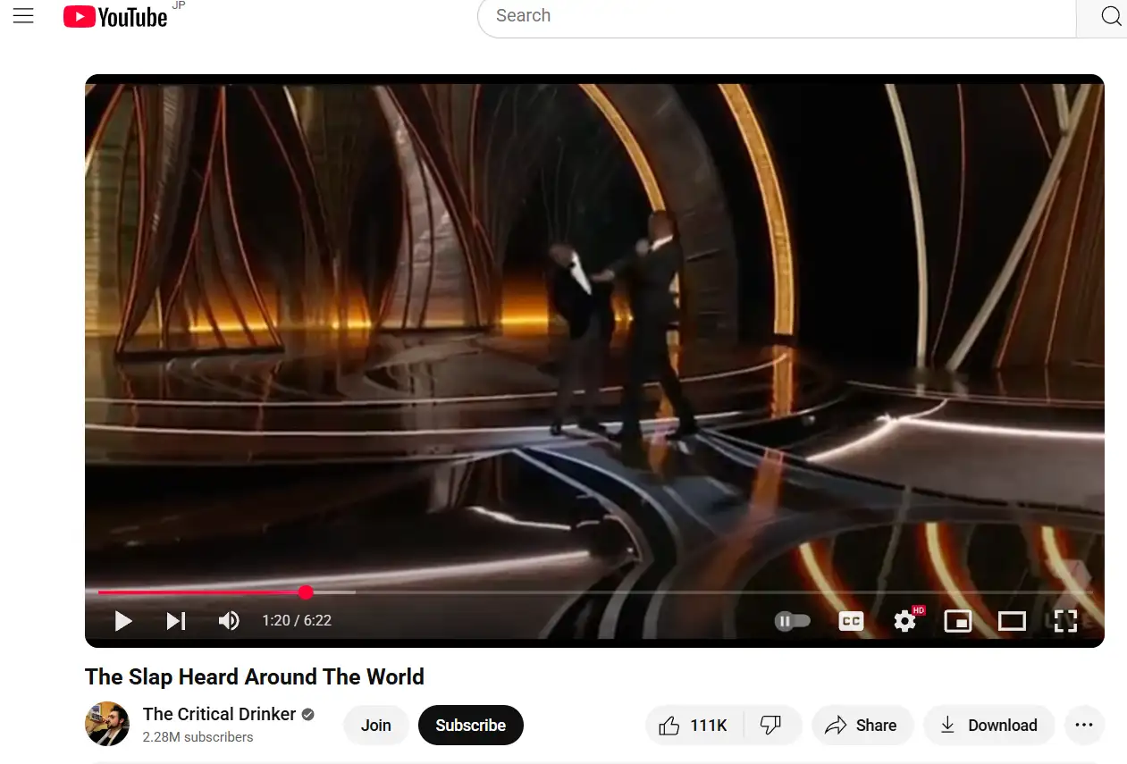 a live shot of will smith slapping chris rock at the oscars